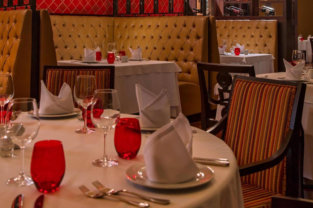 Sheraton Reserva Do Paiva كابو دي سانتو اغوستي المظهر الخارجي الصورة A table set for fine dining